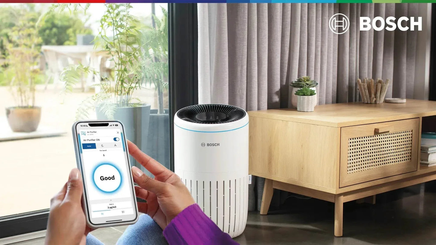 Bosch Air 4000i air purifier with 3-layer filtration and app control in modern living room setting