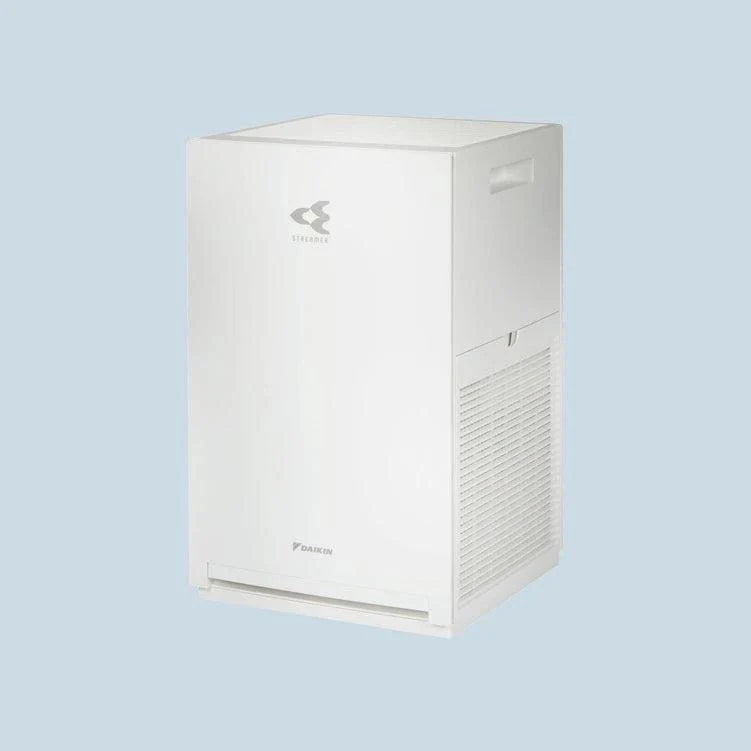 Daikin MC30Y air purifier with electrostatic HEPA filter, compact white design, and silent operation for large room air purification