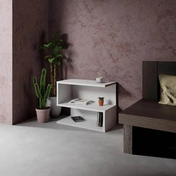 White S-shaped three-shelf bookcase made of durable melamine in a modern room corner