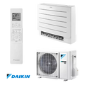 Daikin Perfera FVXM25B floor-standing inverter air conditioner with remote control and outdoor unit, energy efficient and quiet operation.