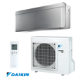 Daikin Stylish FTXA20BS + RXA20A inverter air conditioner with sleek indoor unit, outdoor compressor, remote control, Wi-Fi, Coanda effect, and energy-efficient cooling and heating.