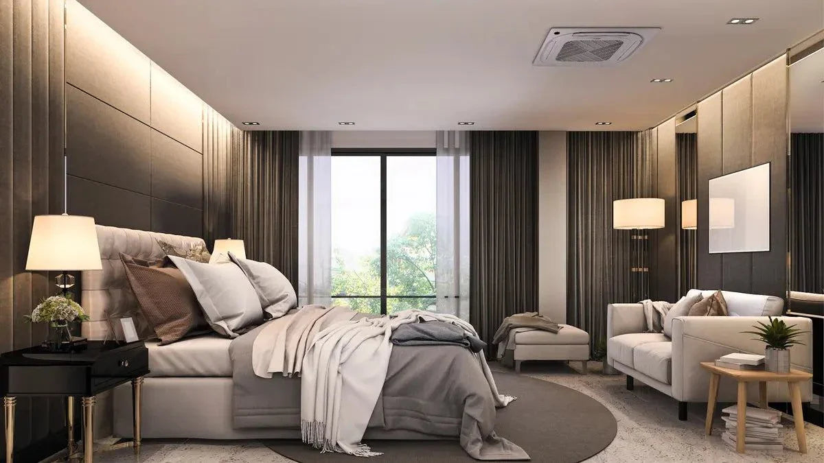 Bosch Climate 5000iU 4-way cassette air conditioner installed in modern bedroom ceiling for efficient cooling and heating.