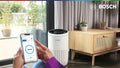 Bosch Air 4000i air purifier with 3-layer filtration and app control in modern living room setting