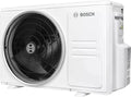 Bosch Climate 5000i outdoor split air conditioner unit with large black fan and white casing designed for energy-efficient cooling and heating.