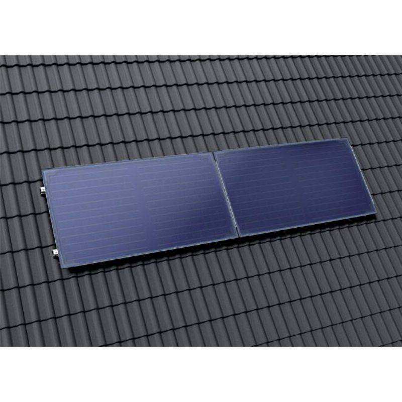 High power selective solar collector Solar 7000 TF with blue coating mounted horizontally on dark tiled roof