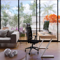 Modern Nith Desk with oak veneer top and white steel legs in a bright home office setting