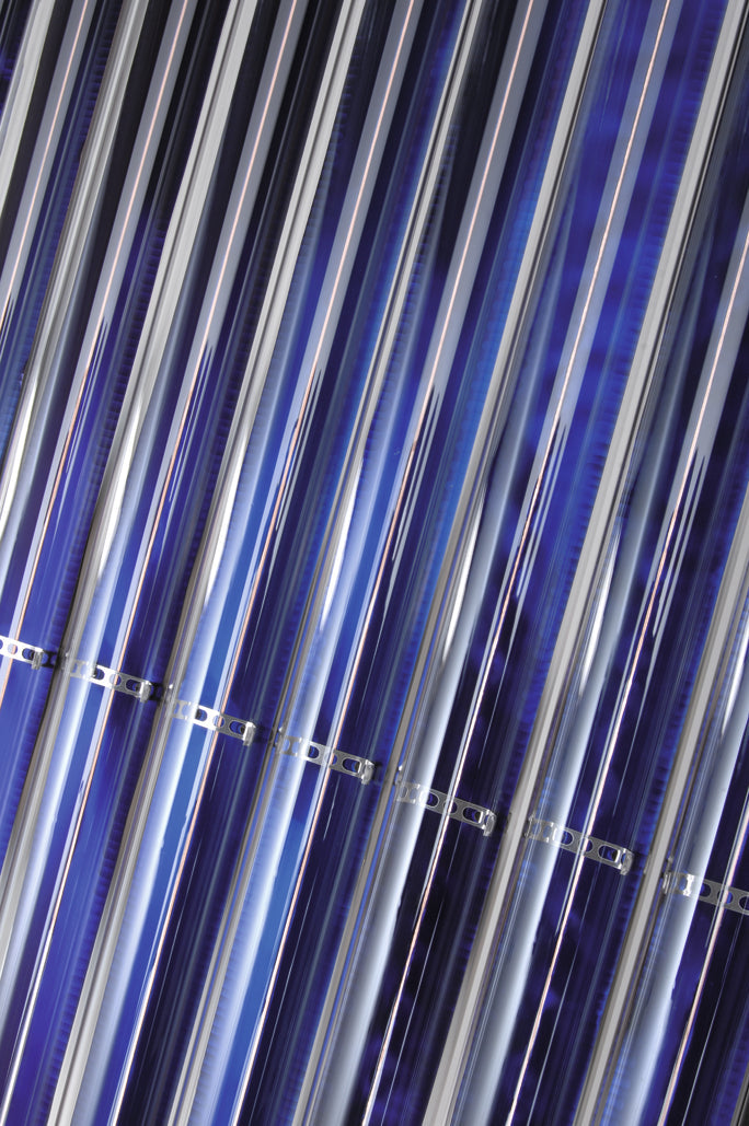 Close-up of VITOSOL 300-TM Viessmann vacuum tube collector with dark blue Absorber surfaces and transparent tubes for efficient heat transfer